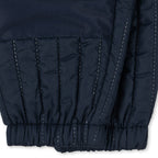 Ensemble veste et pantalon de sport bleu marine matelassés en polyester thermique avec revêtement déperlant pour enfants