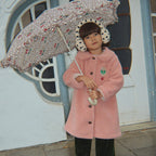 Manteau en polaire rose classique recyclée avec silhouette trapèze et boutons en corne pour enfants