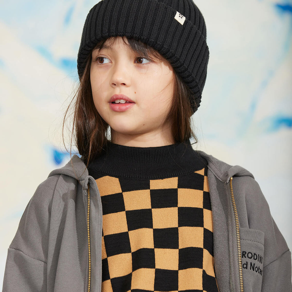 Pull en tricot en coton biologique marron vintage motif échiquier avec épaules tombantes et finitions côtelées pour enfants
