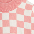 Pull tricoté en coton biologique rose vintage motif damier avec épaules tombantes et finitions côtelées pour enfant