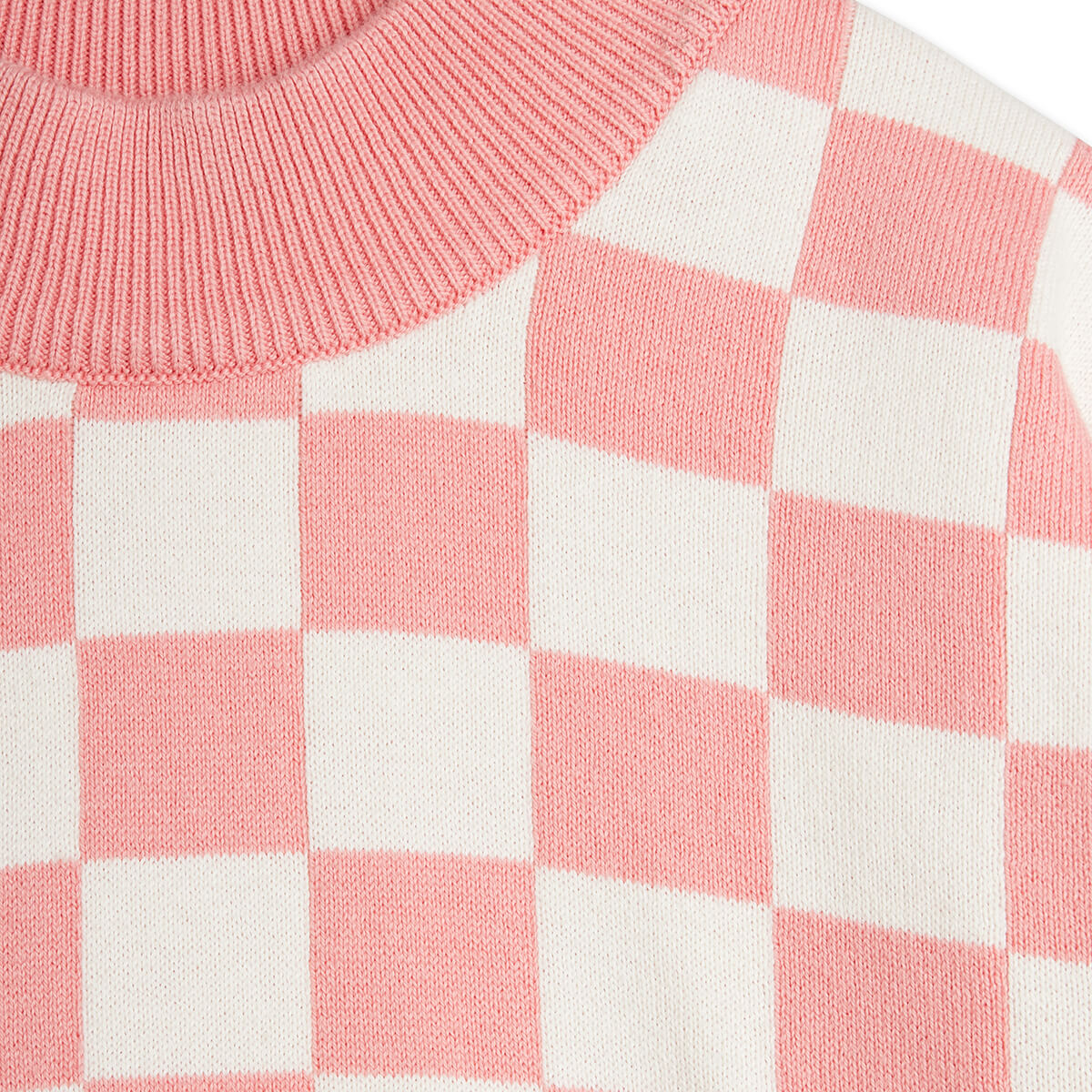Pull tricoté en coton biologique rose vintage motif damier avec épaules tombantes et finitions côtelées pour enfant