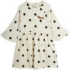 Robe enfant en coton biologique écru à pois imprimé chien avec manches trompette évasées