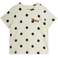 T-shirt ludique en coton stretch bio pour enfants, à imprimé chien à pois blanc cassé