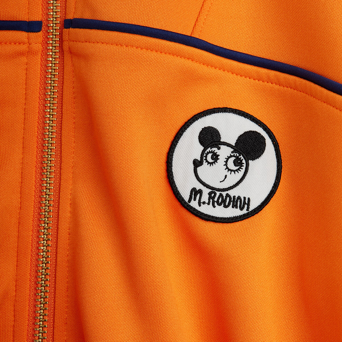 Veste zippée en polyester recyclé à imprimé patchwork orange sportif avec poignets côtelés pour enfant
