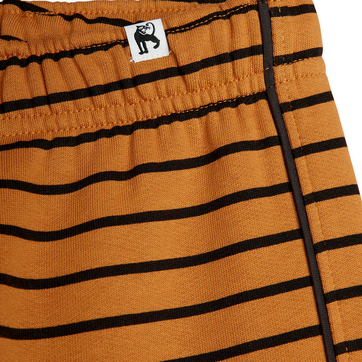 Pantalon de survêtement sport marron rayé en coton biologique avec taille et chevilles élastiquées pour enfants