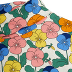 Haut à col roulé pour enfants en coton biologique extensible, motif floral multicolore fantaisie sur l'ensemble