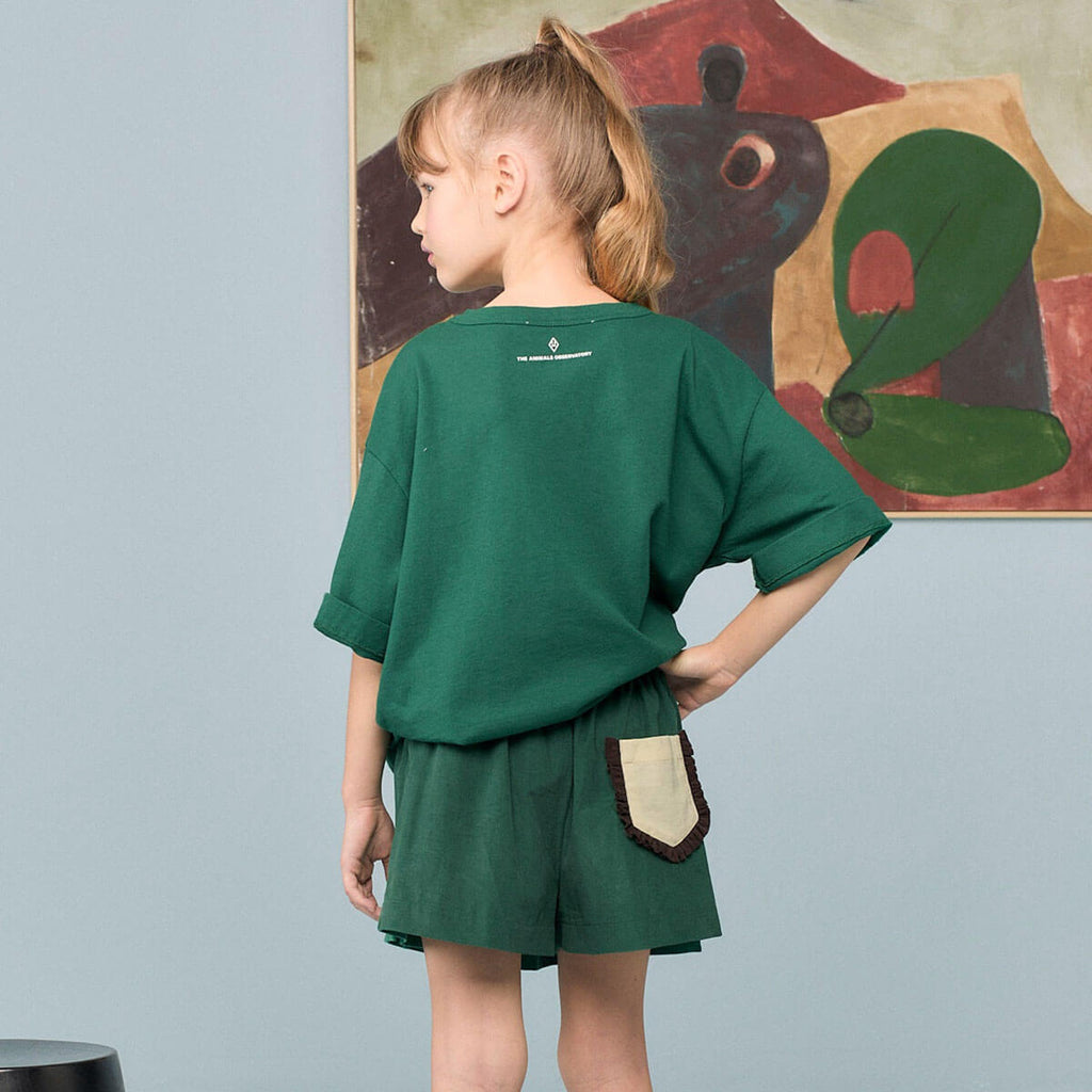 T-shirt surdimensionné en coton biologique avec imprimé fusée vert foncé ludique pour enfants expressifs
