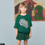 T-shirt surdimensionné en coton biologique avec imprimé fusée vert foncé ludique pour enfants expressifs